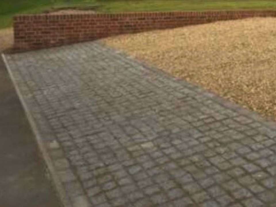Cobbles driveway with brick wall in Suffolk