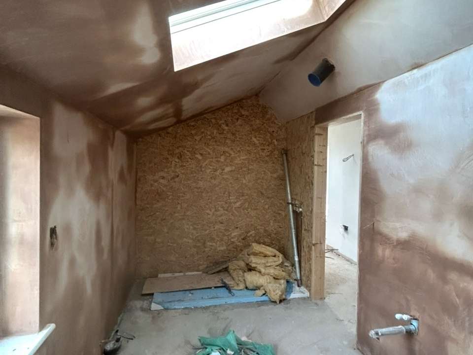 Plaster repair work in bathroom, Suffolk