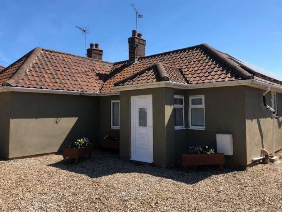 Smooth exterior render on home in Suffolk