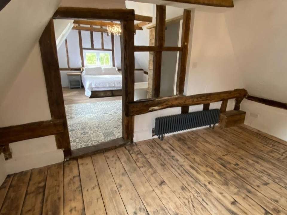 Completed loft plastering after renovation in Suffolk