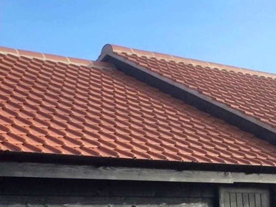 Red clay tile roof completed in Suffolk