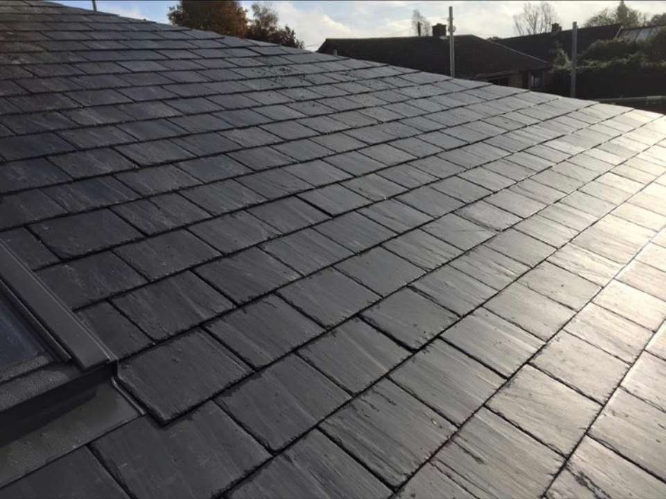 Slate roof installation in progress, Suffolk